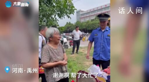 大娘考點擺攤城管包圓送家長 這桃我們都要了