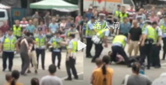 抱嬰兒男子被按在地 派出所回應