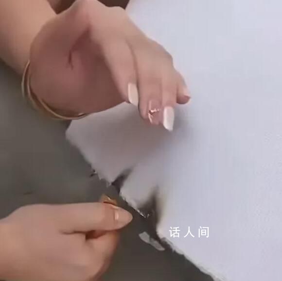 商戶招牌因易燃遭拆除卻無法點燃 城管這樣做真是太愚蠢了