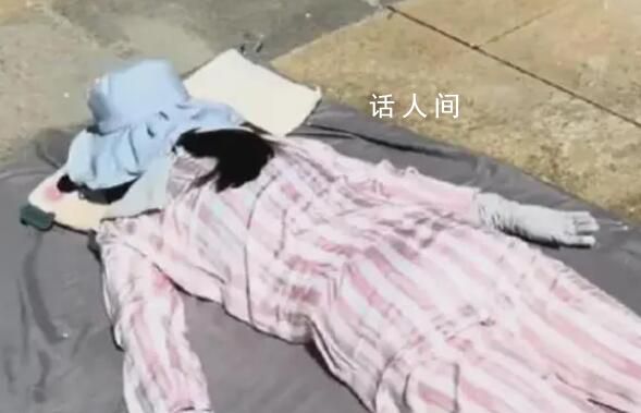 女子高溫全副武裝趴水泥地上曬背 引發(fā)了人們的廣泛猜測和爭議